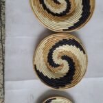 hand-woven raffia or grass wall baskets.